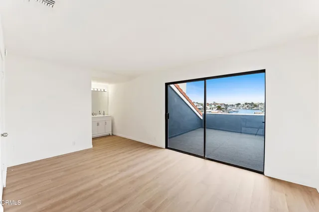a view of a living room with a large window