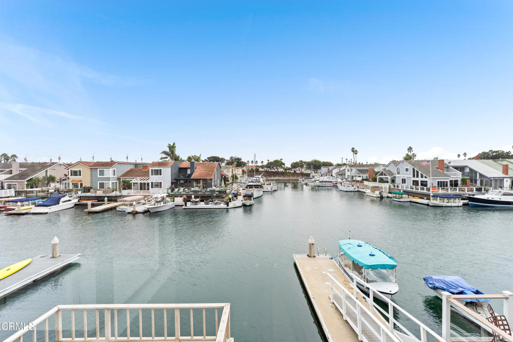 4320 Meridian Avenue Oxnard, CA 93035 - Photo 28 of 31 a view of a lake with boats and trees in the background