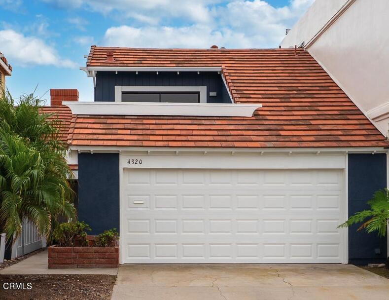 4320 Meridian Avenue Oxnard, CA 93035 - Photo 3 of 32 a side view of a house with garage