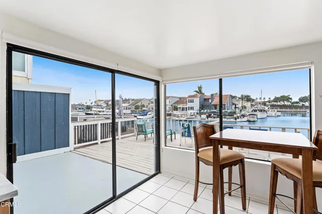 a room with a table and chairs