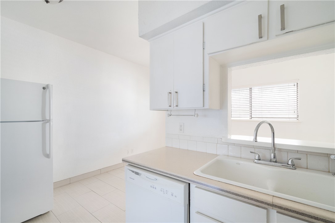 2605 Enfield Road, Unit 110 Austin, TX 78703 - Photo 21 of 22 Kitchen Window to the Living- Room