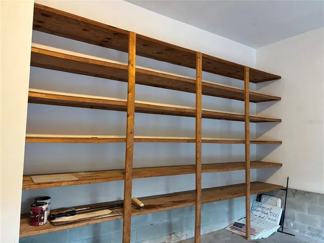 a view of a room with racks on the wall