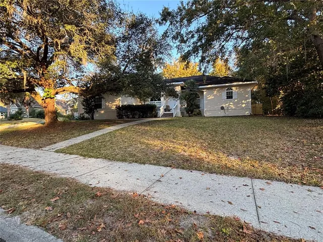 a view of a house with a trees