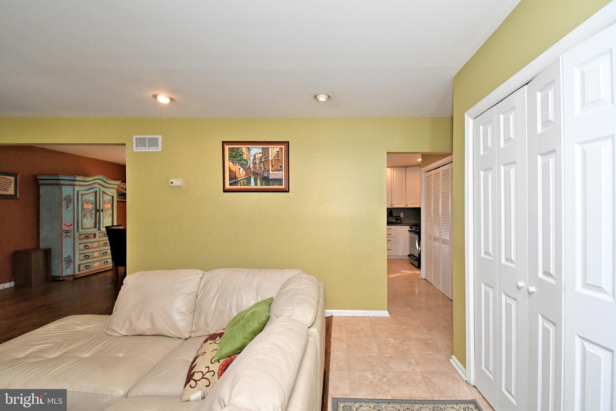 1113 Clark Road Wyndmoor, PA 19038 - Photo 13 of 68 a bedroom with a bed and a painting on the wall