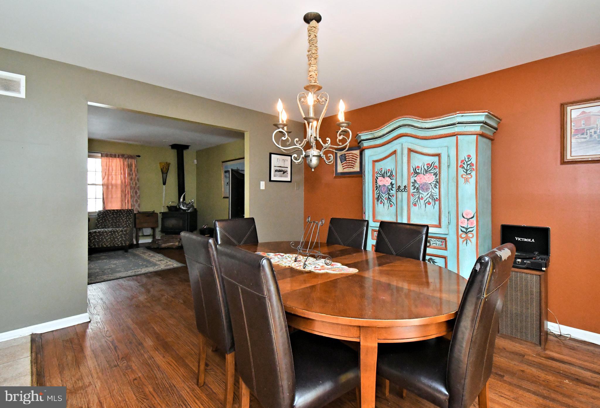 1113 Clark Road Wyndmoor, PA 19038 - Photo 20 of 68 a view of a dining room with furniture window and wooden floor