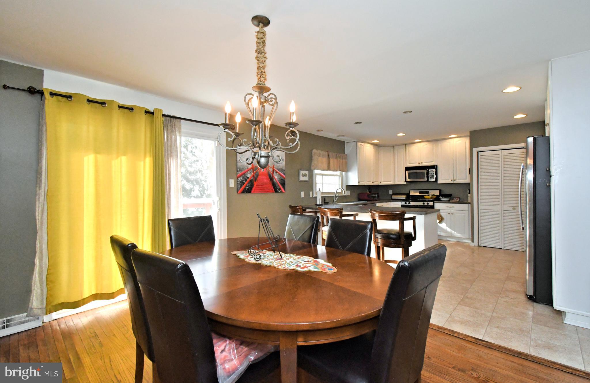 1113 Clark Road Wyndmoor, PA 19038 - Photo 21 of 68 a view of a dining room with furniture window and outside view