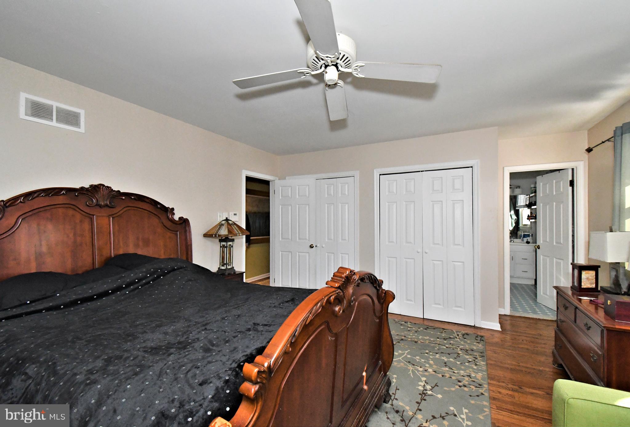 1113 Clark Road Wyndmoor, PA 19038 - Photo 31 of 68 a living room with a bed furniture and a ceiling fan