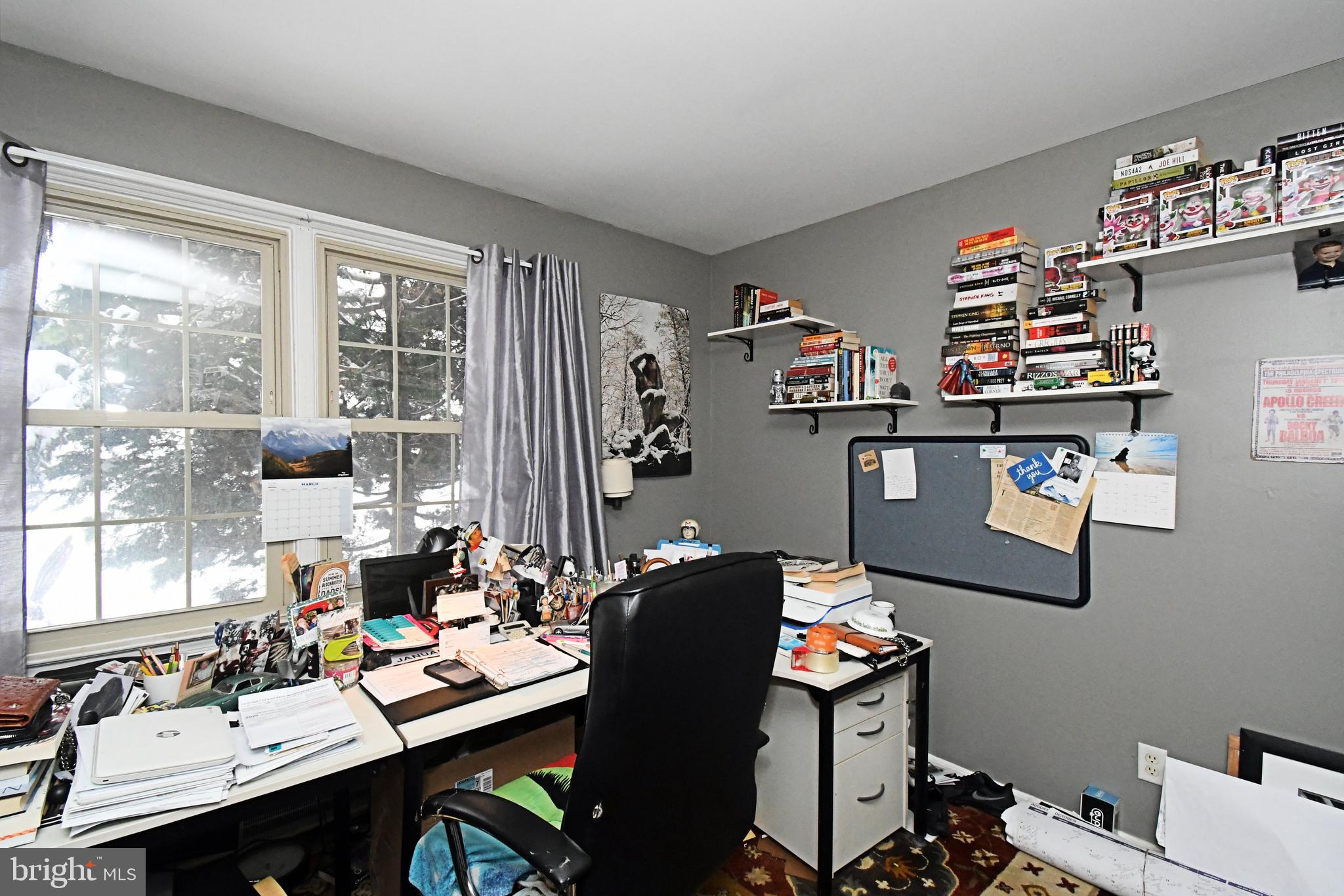 1113 Clark Road Wyndmoor, PA 19038 - Photo 40 of 68 a living room with furniture a rug and a window