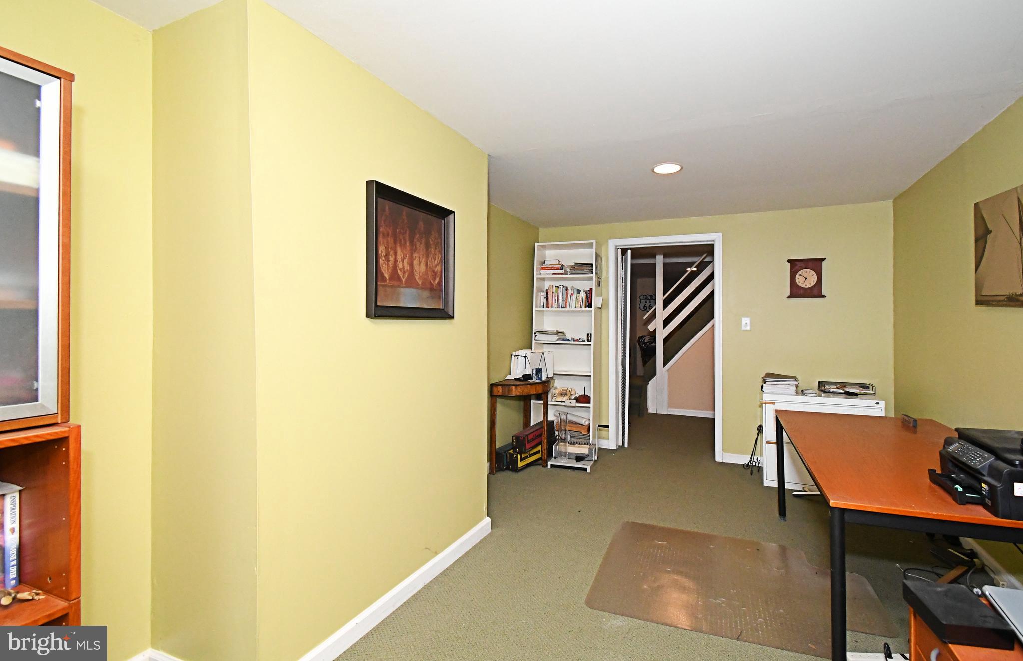 1113 Clark Road Wyndmoor, PA 19038 - Photo 47 of 68 a workspace with furniture and wall paintings