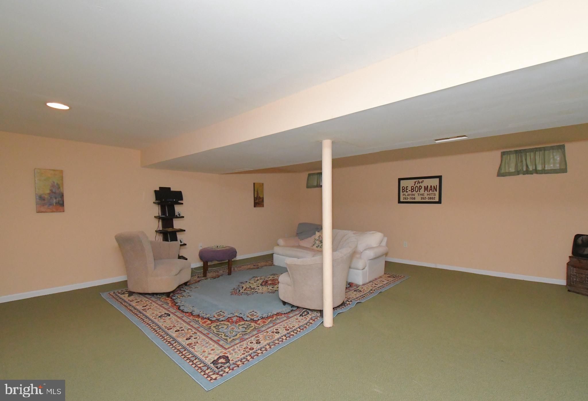 1113 Clark Road Wyndmoor, PA 19038 - Photo 49 of 68 a living room with hard wood floor and a table