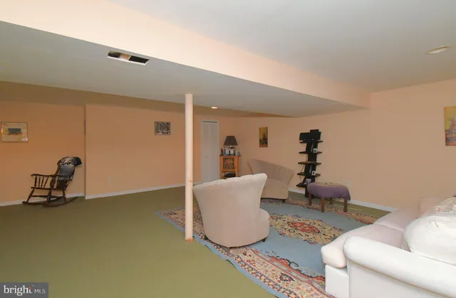 a view of a house with a yard and garage