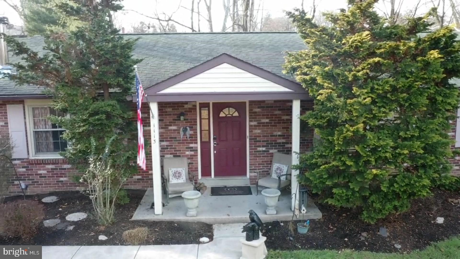1113 Clark Road Wyndmoor, PA 19038 - Photo 5 of 68 a front view of a house with garden