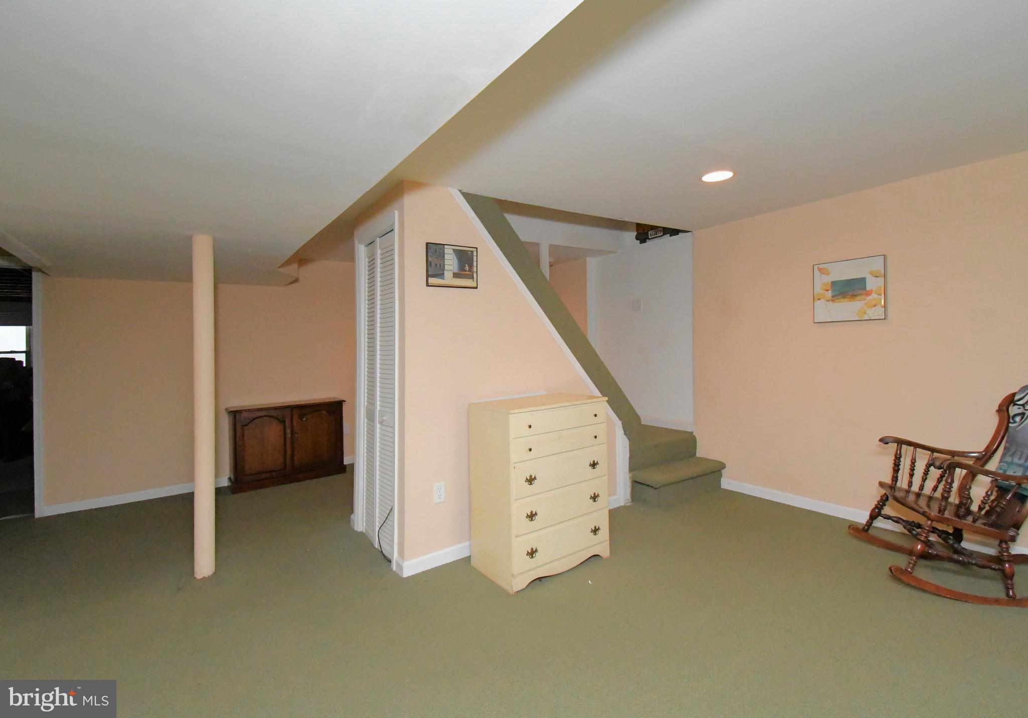 1113 Clark Road Wyndmoor, PA 19038 - Photo 53 of 68 a view of an empty room with stairs
