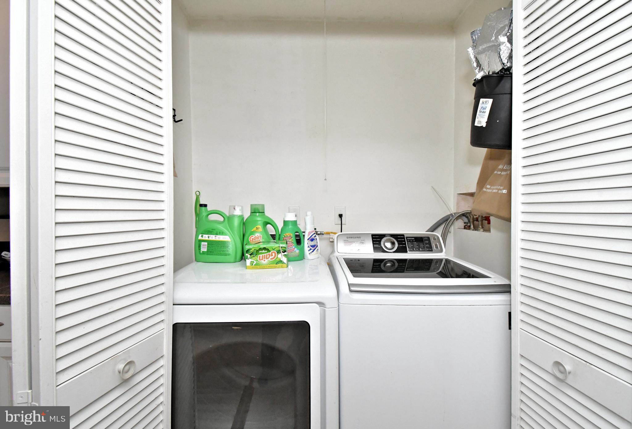 1113 Clark Road Wyndmoor, PA 19038 - Photo 55 of 68 a kitchen with a white stove top oven and sink