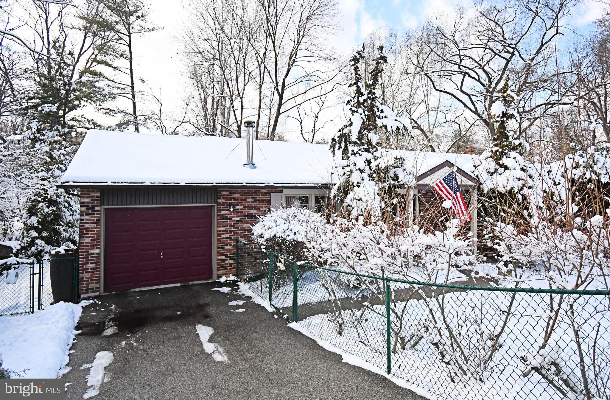 1113 Clark Road Wyndmoor, PA 19038 - Photo 68 of 68 a view of a house with a yard and garage