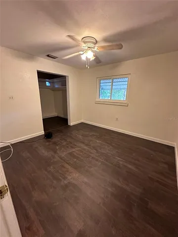a kitchen with a sink and a stove top oven