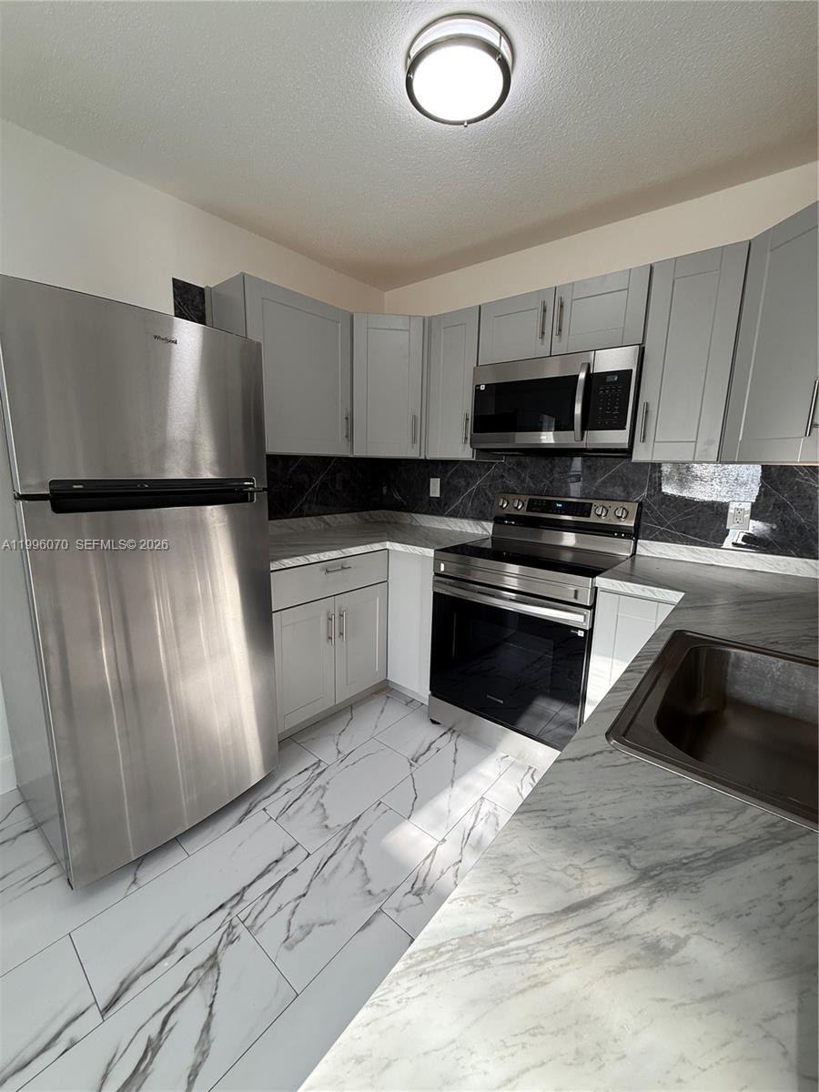 6071 Southwest 33rd Street, Unit 4 Miramar, FL 33023 - Photo 2 of 20