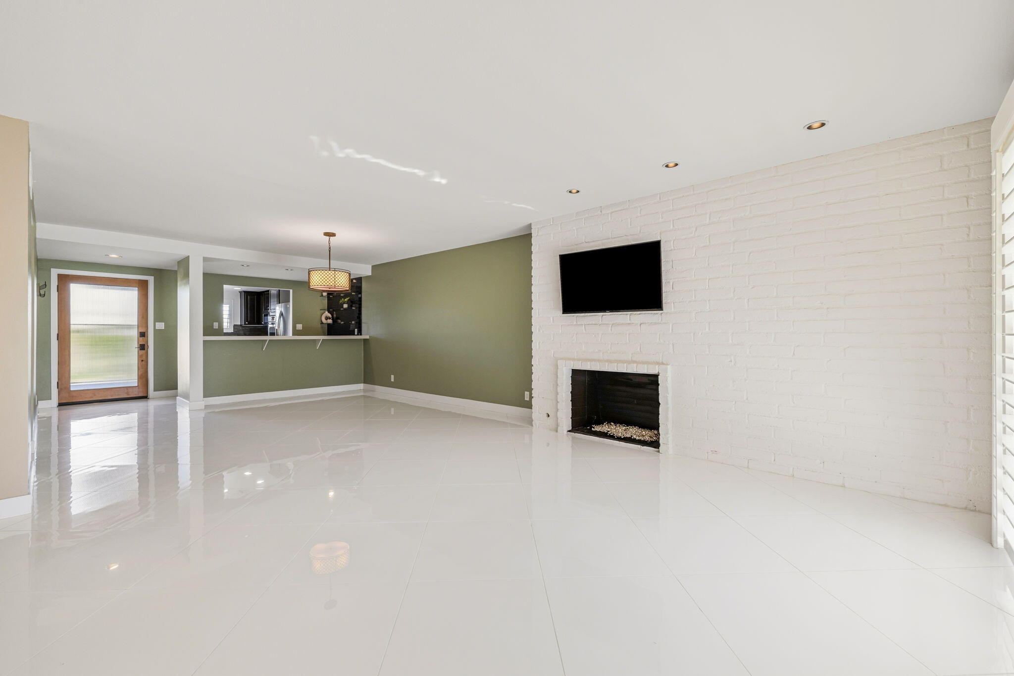 72915 Homestead Road Palm Desert, CA 92260 - Photo 13 of 45 a view of a livingroom with a fireplace