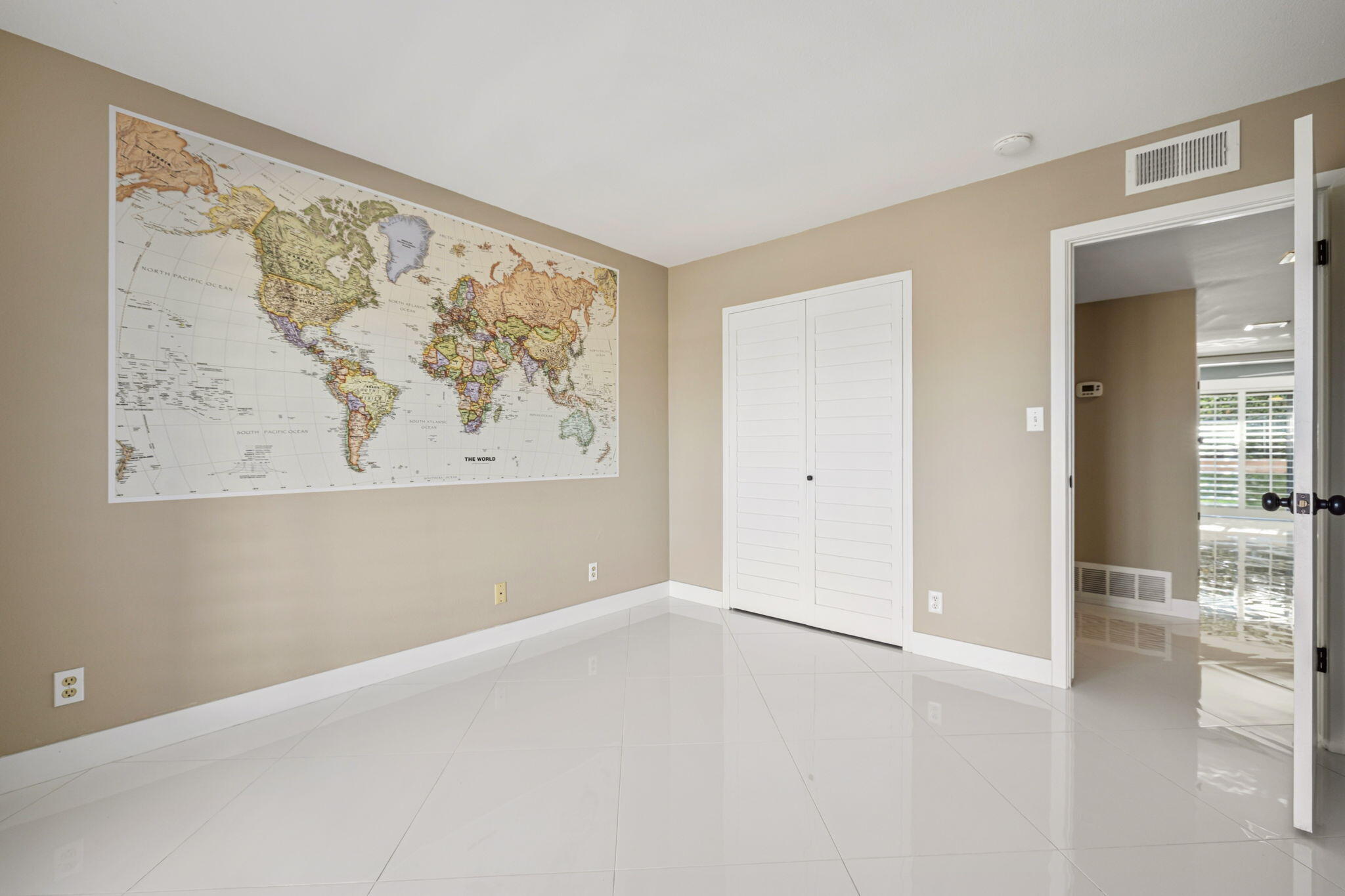 72915 Homestead Road Palm Desert, CA 92260 - Photo 15 of 45 wooden floor in a empty room with a window