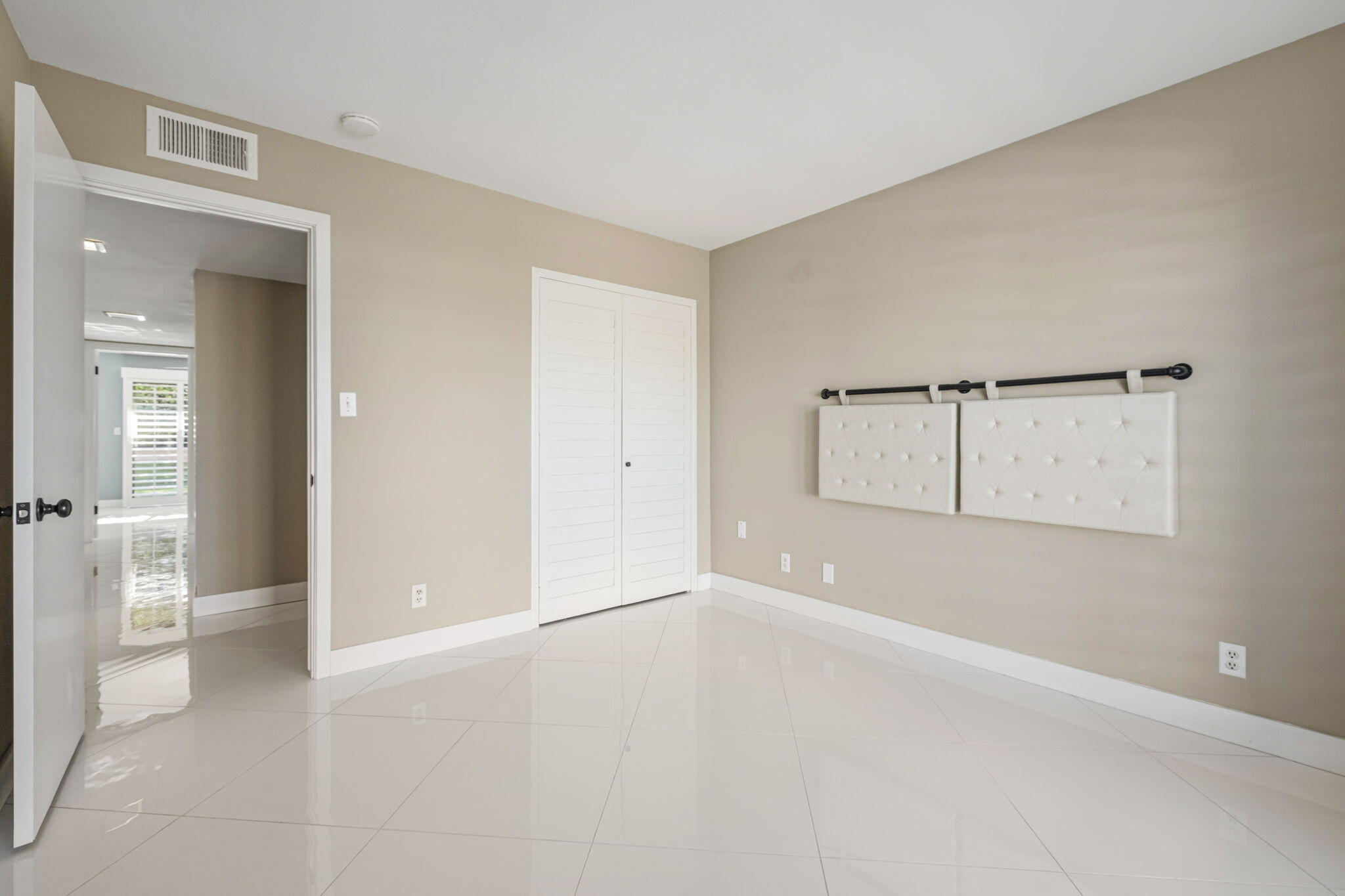 72915 Homestead Road Palm Desert, CA 92260 - Photo 19 of 45 wooden floor in an empty room