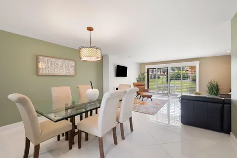 a kitchen with granite countertop stainless steel appliances and cabinets