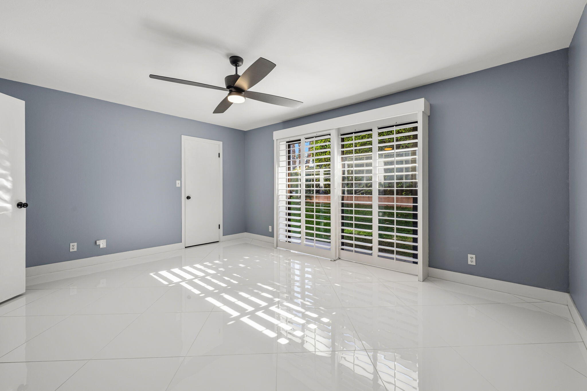 72915 Homestead Road Palm Desert, CA 92260 - Photo 21 of 45 a view of an empty room with a window