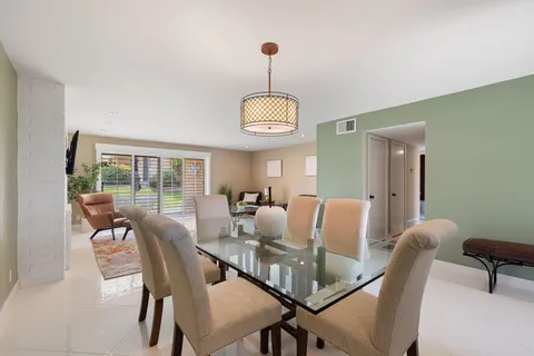a kitchen with a sink and a refrigerator
