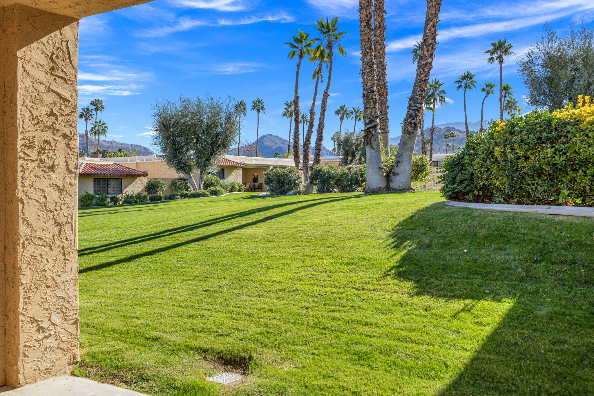 72915 Homestead Road Palm Desert, CA 92260 - Photo 35 of 45 a view of an outdoor space and swimming pool