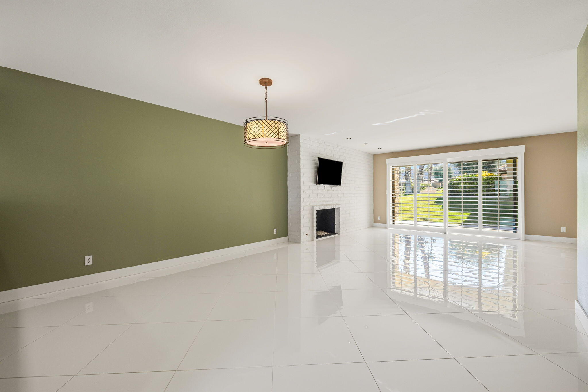 72915 Homestead Road Palm Desert, CA 92260 - Photo 7 of 45 a view of empty room with windows