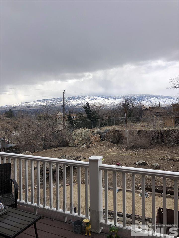 170 Redstone Drive Reno, NV 89512 - Photo 15 of 17 a view of a balcony with wooden floor