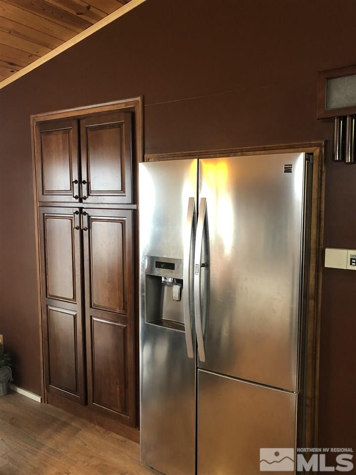 170 Redstone Drive Reno, NV 89512 - Photo 5 of 17 a view of a refrigerator in kitchen and a refrigerator