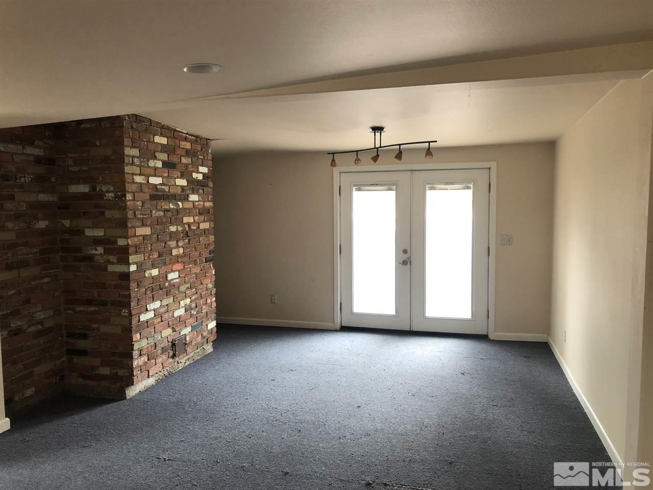 170 Redstone Drive Reno, NV 89512 - Photo 8 of 17 a view of an empty room and window