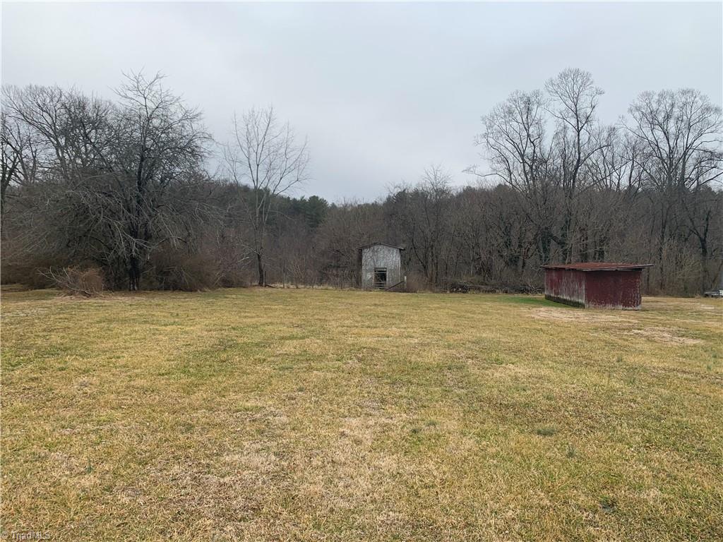 1344 Pipers Gap Road Mount Airy, NC 27030 - Photo 13 of 16 Barn with pasture behind it