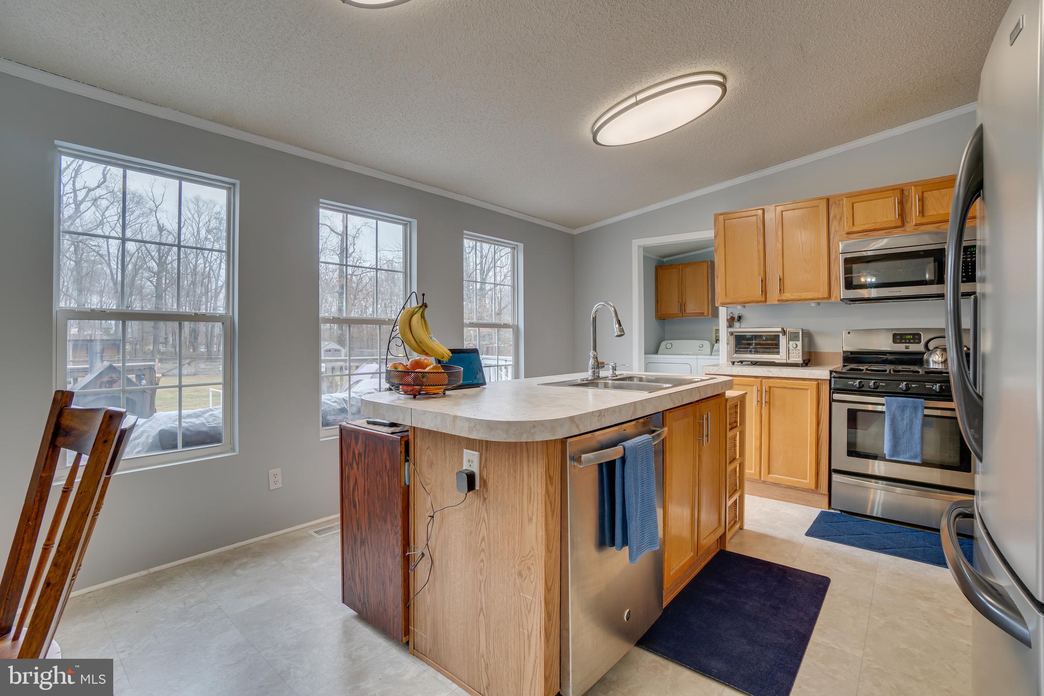16067 Stevensburg Road Brandy Station, VA 22714 - Photo 9 of 41 Kitchen Island with New Sink & Faucet