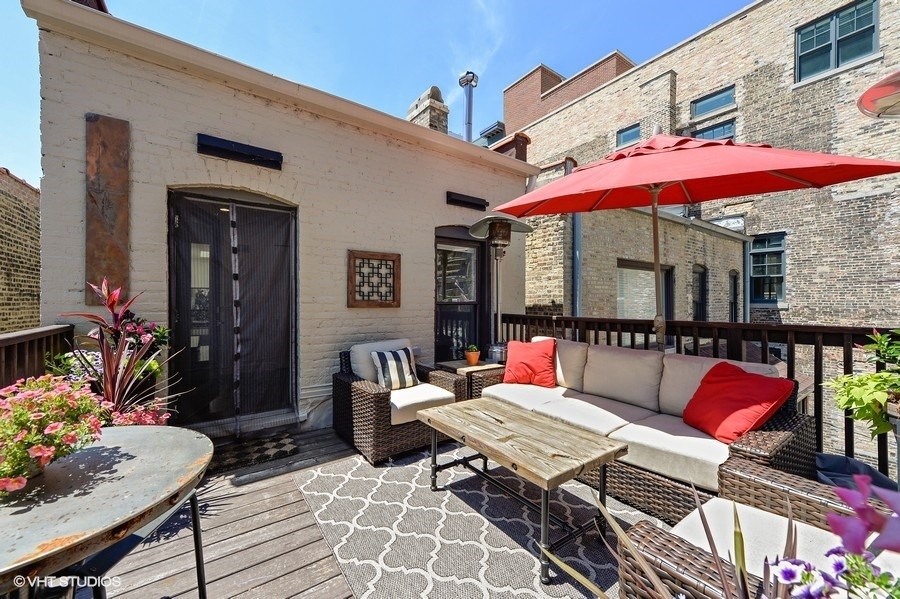 1439 North Dearborn Street, Unit 2 Chicago, IL 60610 - Photo 16 of 18 a outdoor space with patio the couches and a potted plant