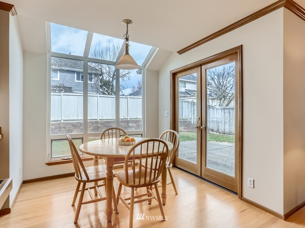 3007 215th Street Southeast Bothell, WA 98021 - Photo 14 of 28 a view of a dining room with furniture window and outside view