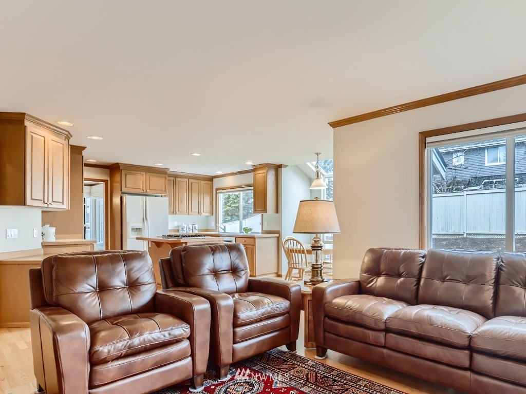 3007 215th Street Southeast Bothell, WA 98021 - Photo 16 of 28 a living room with furniture and a window