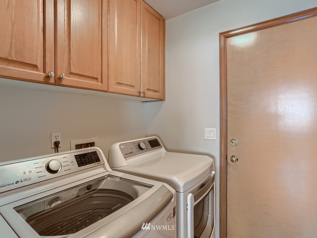 3007 215th Street Southeast Bothell, WA 98021 - Photo 26 of 28 a utility room with dryer and washer