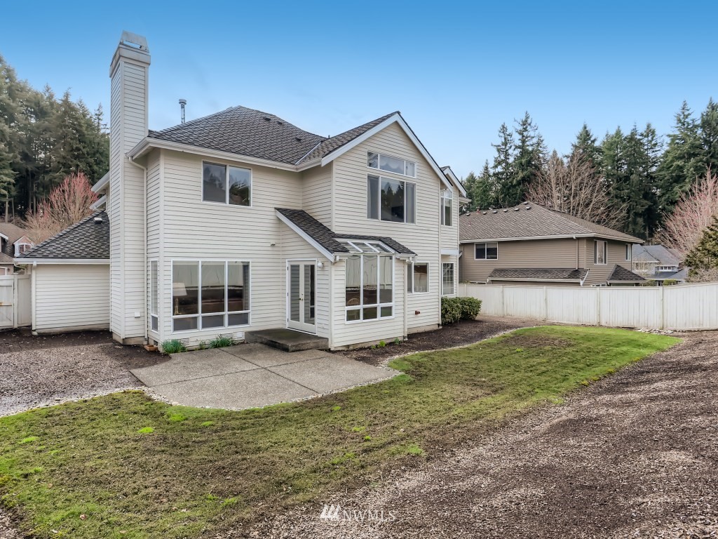 3007 215th Street Southeast Bothell, WA 98021 - Photo 27 of 28 a view of a house with a yard