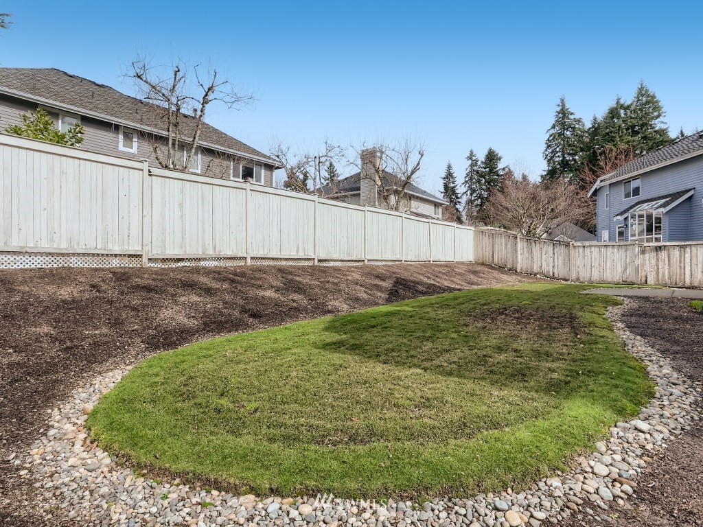 3007 215th Street Southeast Bothell, WA 98021 - Photo 28 of 28 a view of a backyard with a garden