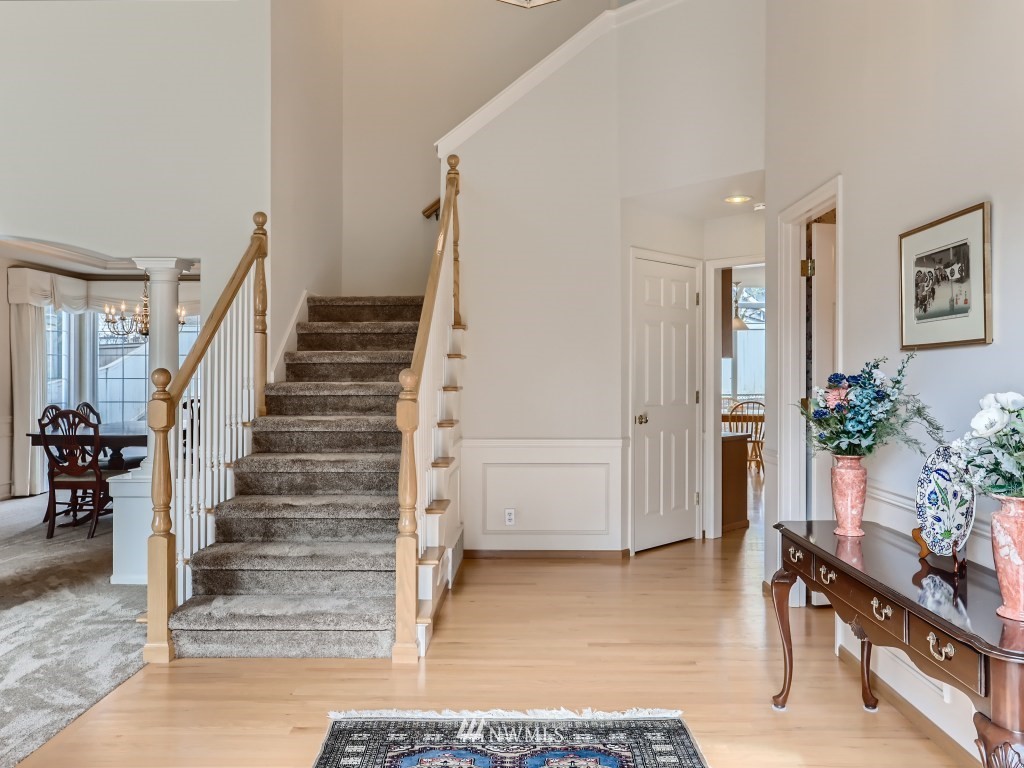 3007 215th Street Southeast Bothell, WA 98021 - Photo 4 of 28 a view of entryway with livingroom and furniture