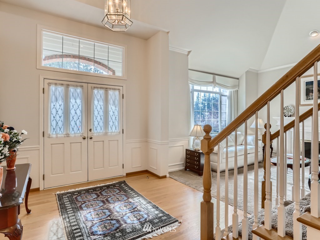 3007 215th Street Southeast Bothell, WA 98021 - Photo 5 of 28 a view of an entryway with wooden floor