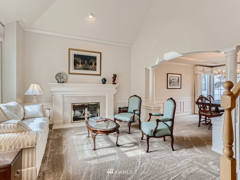 3007 215th Street Southeast Bothell, WA 98021 - Photo 6 of 28 a living room with furniture and a fireplace