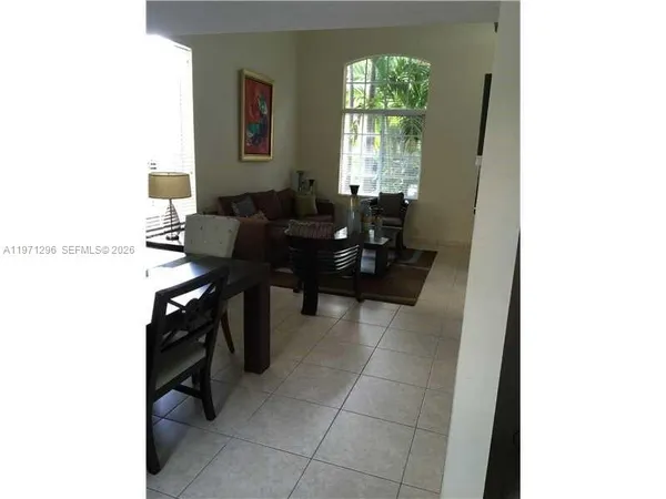 a living room with furniture and window