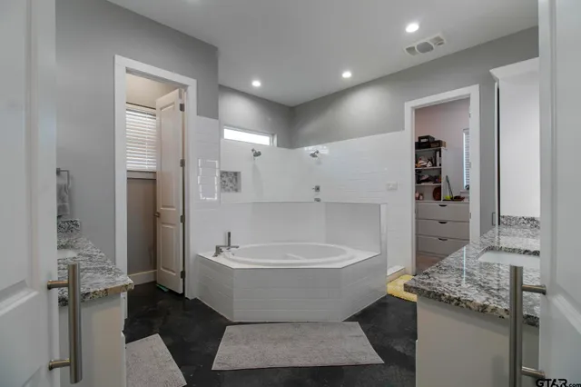 a view of a bathtub in a bathroom