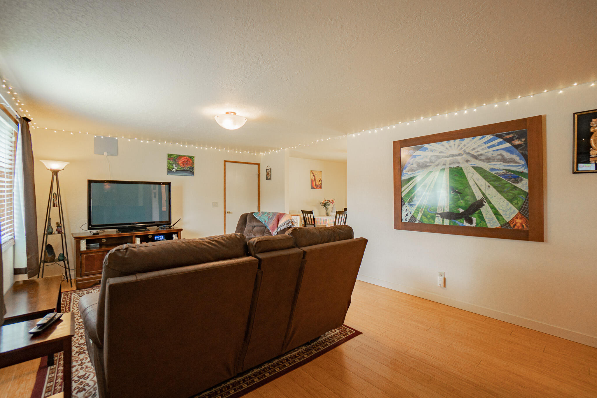 537 Bell Road Talent, OR 97540 - Photo 7 of 23 a living room with furniture and a flat screen tv