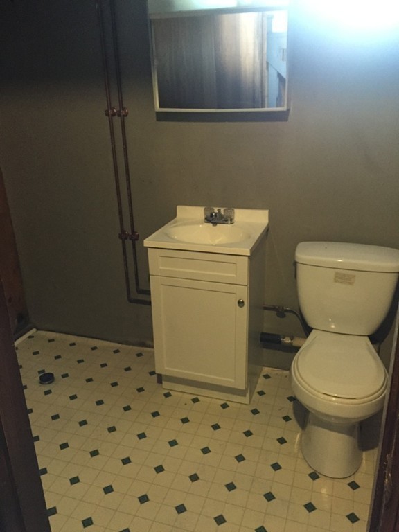 33 2nd Island Road Webster, MA 01570 - Photo 20 of 27 a bathroom with a sink and a toilet