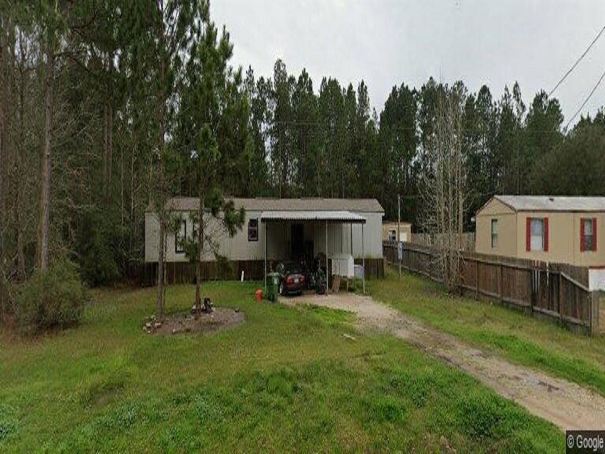 19278 Amy Lane Porter, TX 77365 - Photo 10 of 12 a view of a chair and table in backyard of the house