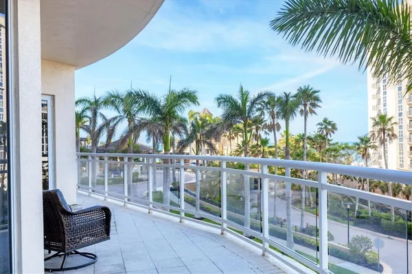 a swimming pool with outdoor seating and yard