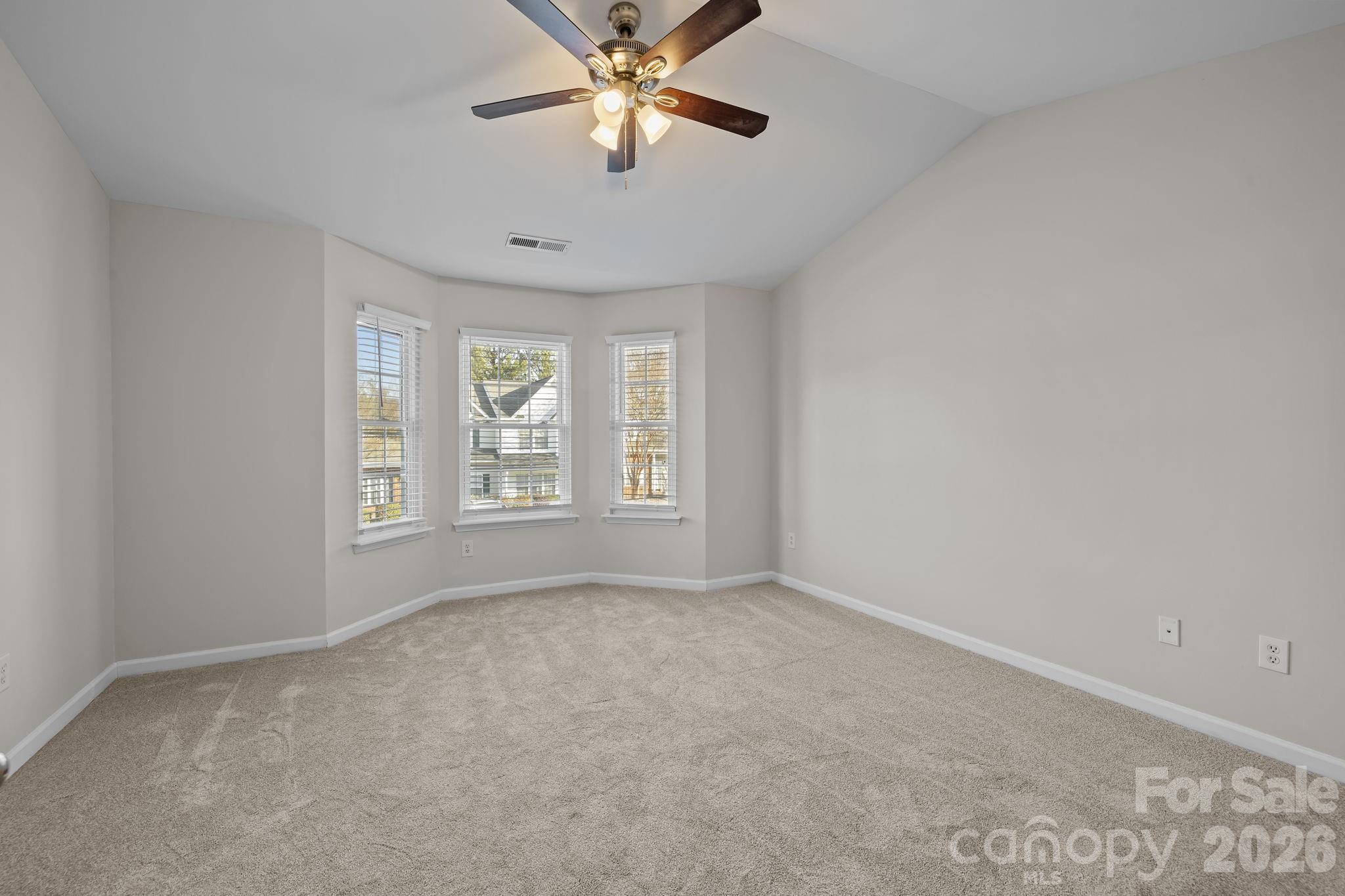 209 Primrose Walk Fort Mill, SC 29715 - Photo 21 of 39 a view of an empty room with a window